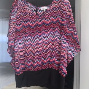 Multi-colored sheer blouse with black waist band